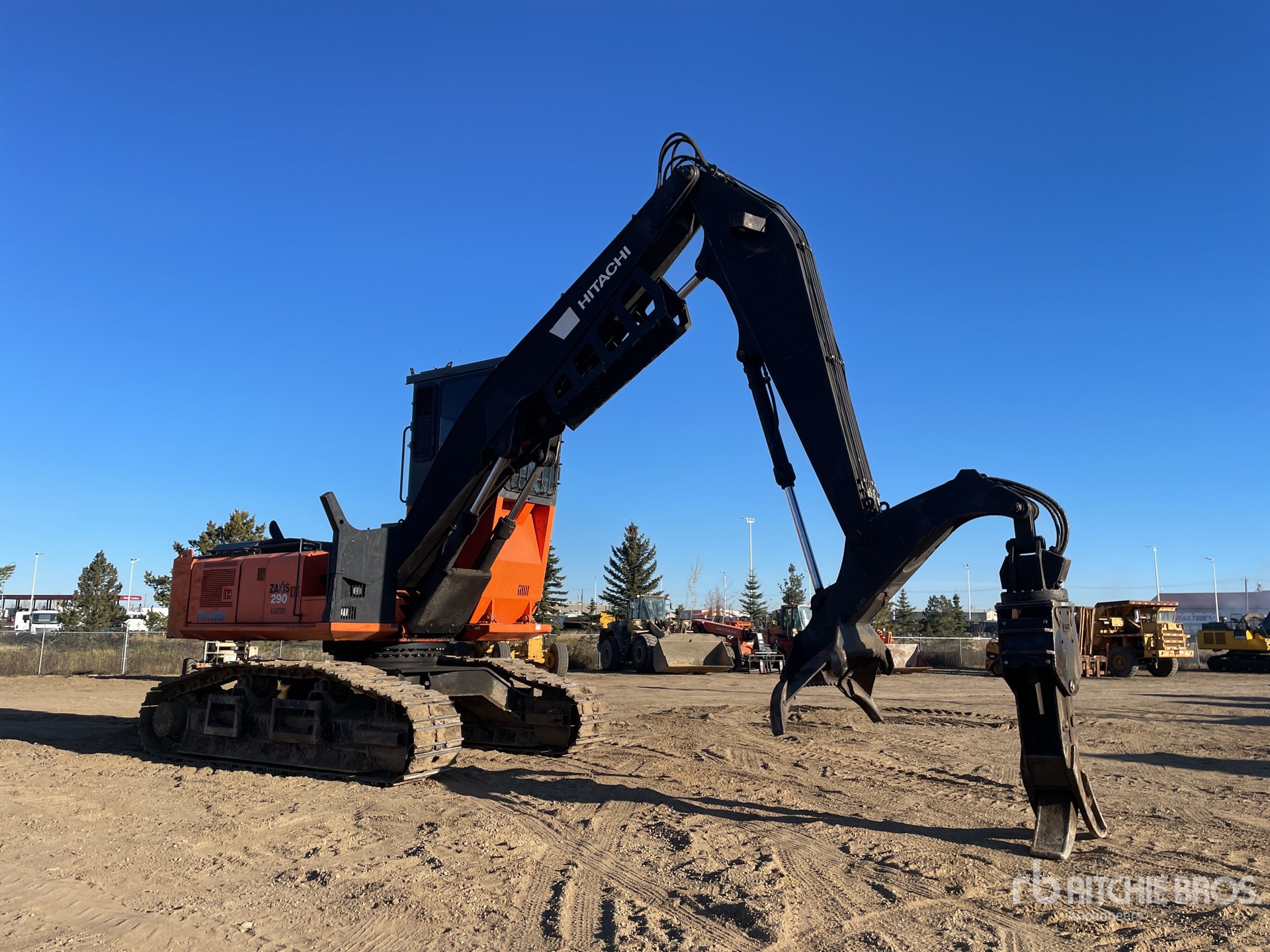 Tmar Logging 2014 Hitatchi ZX290F-3 Heel Boom Log Loader | Ritchie Bros. Auctioneers