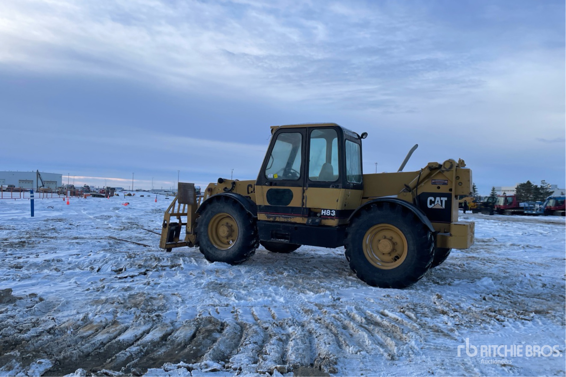 1998 Cat TH83 Telehandler | Ritchie Bros. Auctioneers