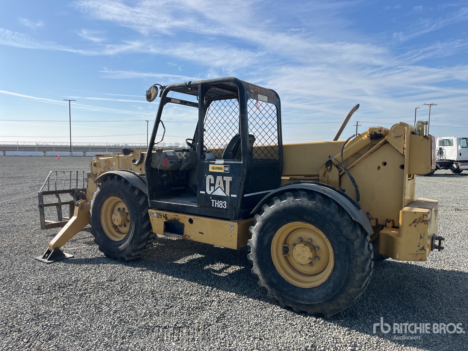 2001 Cat TH83 Telehandler | Ritchie Bros. Auctioneers