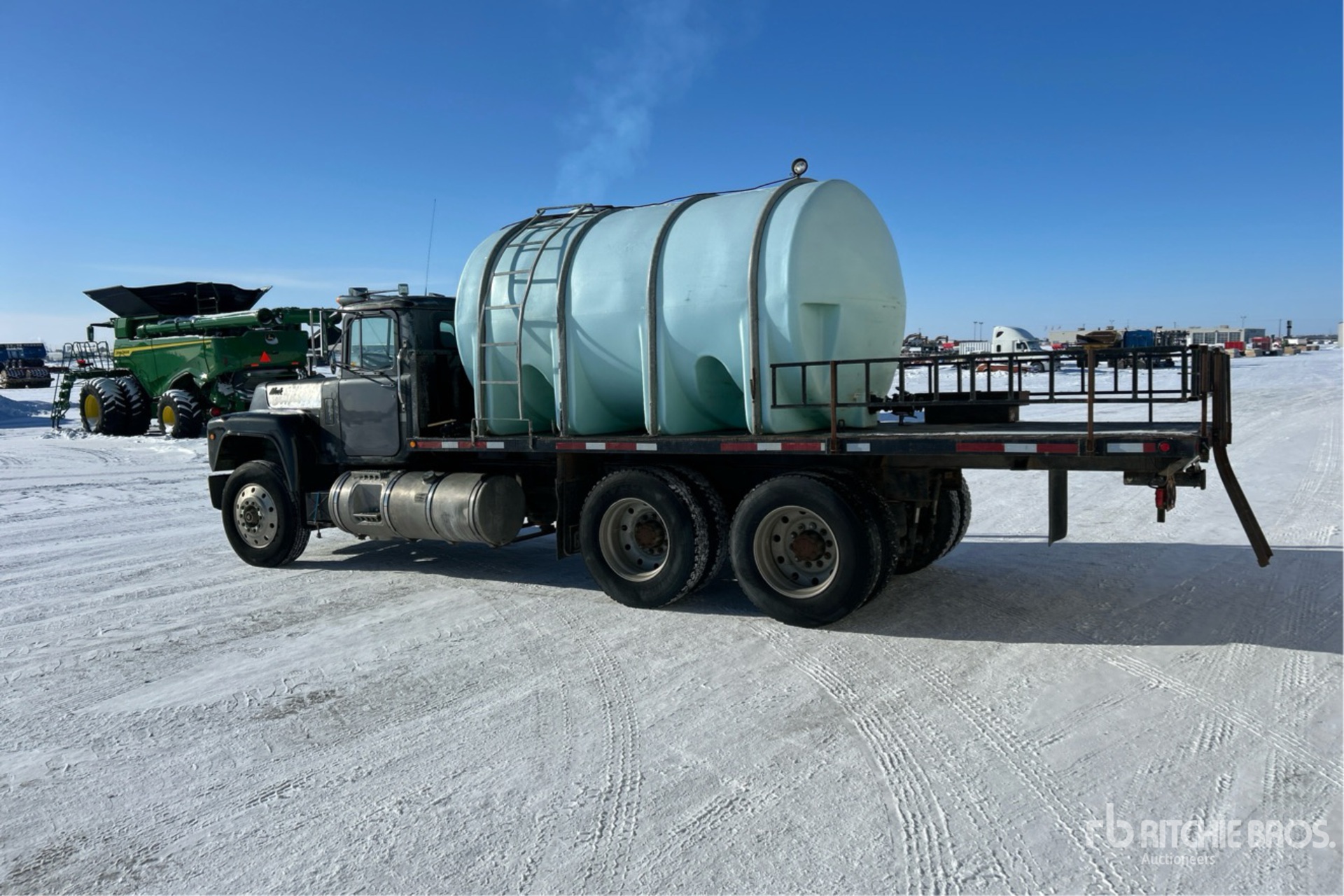 1986 Mack R688ST 6x4 Flatbed Truck | Ritchie Bros. Auctioneers