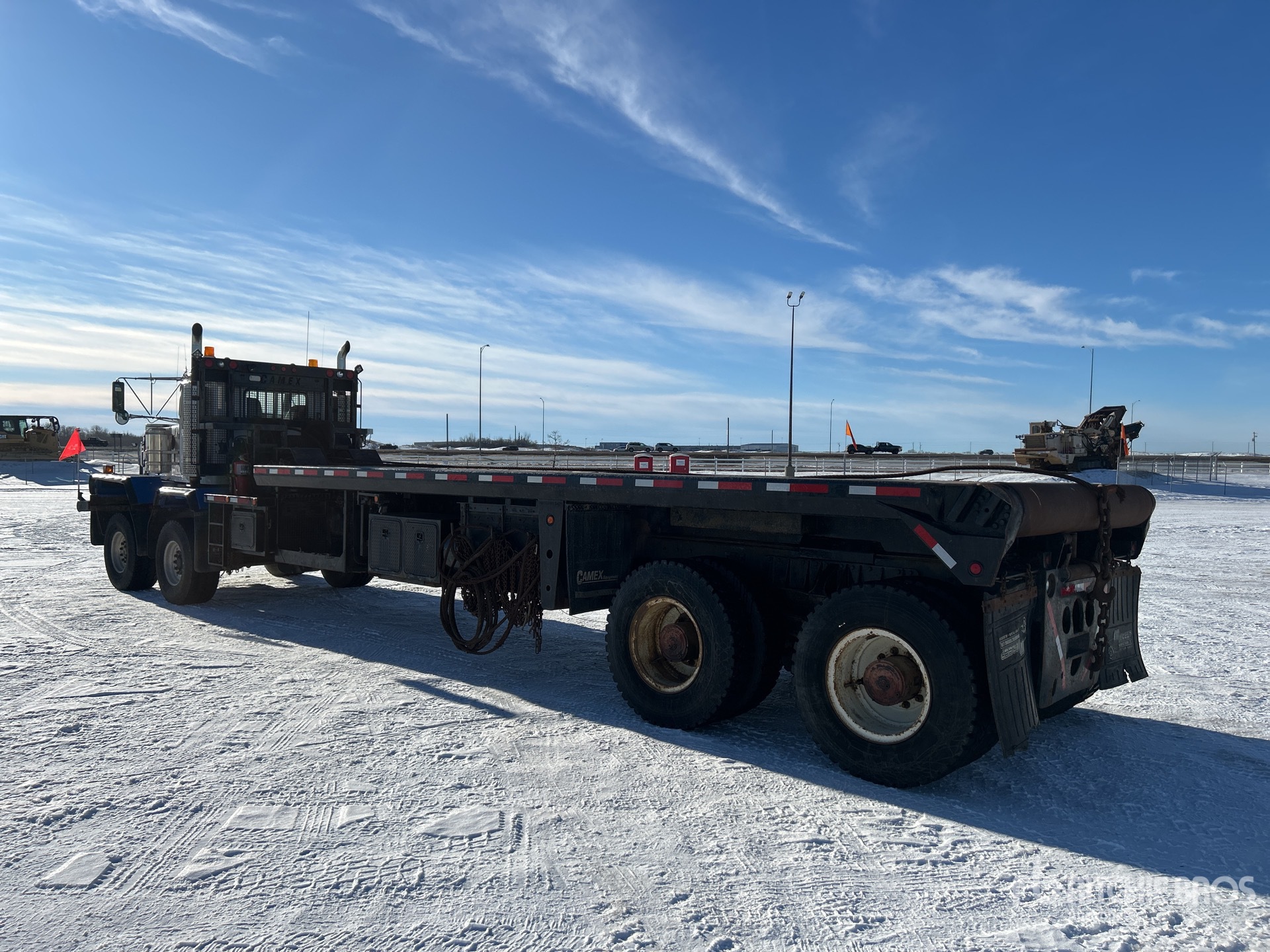 2004 Kenworth C500B 8x4 Twin-Steer Bed Truck | Ritchie Bros. Auctioneers