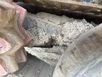 Undercarriage with Left Track Tensioner