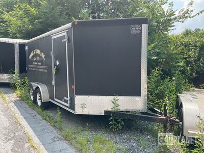 Car Mate T/A Enclosed Trailer w/Grasshopper Mower