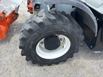 Telehandler* with Left Front Tire