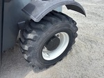 Telehandler* with Left Rear Tire