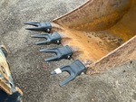 Specialty with Backhoe / Excavator Bucket Shanks and Teeth