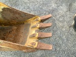 Specialty with Backhoe / Excavator Bucket Shanks and Teeth