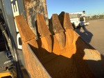 Specialty with Backhoe / Excavator Bucket Shanks and Teeth