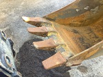 Specialty with Backhoe / Excavator Bucket Shanks and Teeth