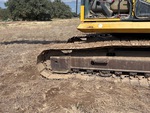 Undercarriage with Left Track Tensioner