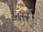 Specialty with Backhoe / Excavator Bucket Shanks and Teeth