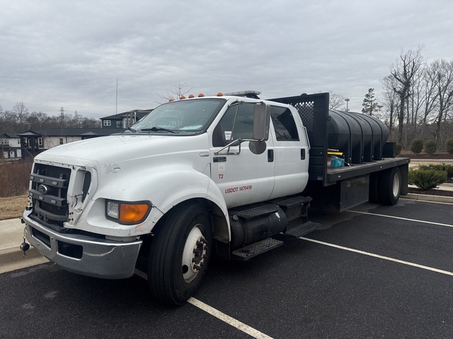 2013 Ford F-650 XLT 1625 gal 4x2 Crew Cab Flatbed Water Truck 2013 Ford F-650 XLT 1625 gal 4x2 Crew Cab Flatbed Water Truck