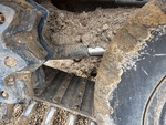 Undercarriage with Left Track Tensioner