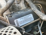 Engine with Emission Certification Label