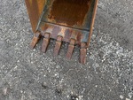Specialty with Backhoe / Excavator Bucket Shanks and Teeth