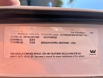 Moteur with Emission Label