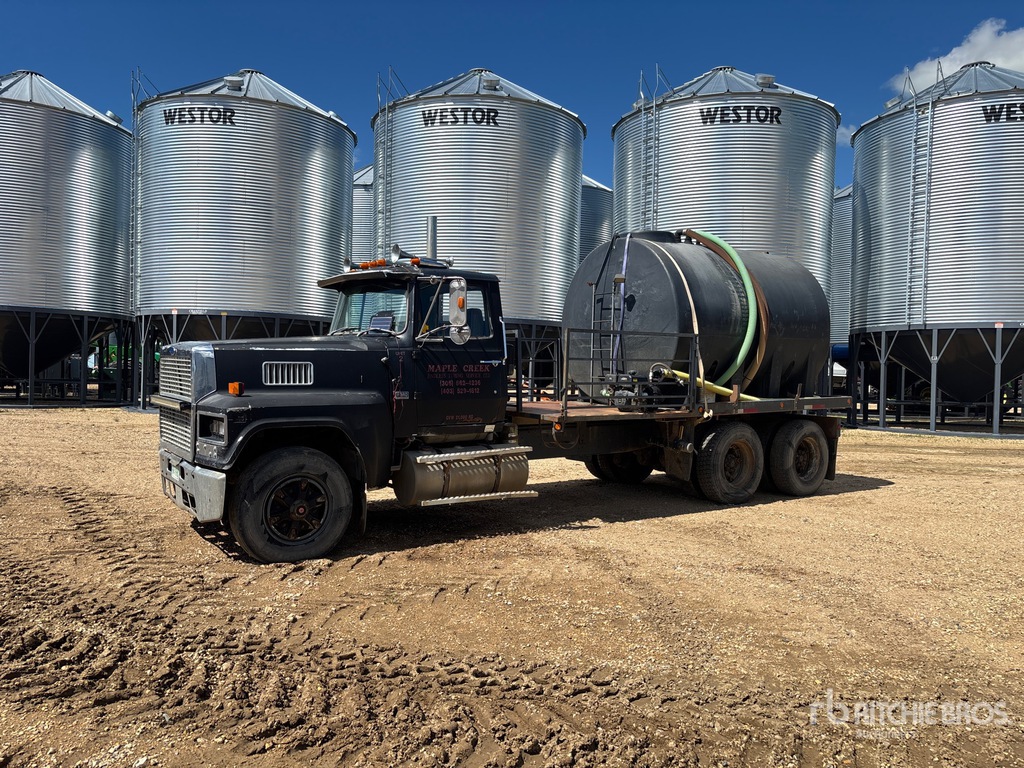 1984 Ford LTL9000 6x4 Flatbed Truck | Ritchie Bros. Auctioneers