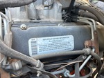 Engine with Emission Certification Label