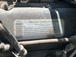 Engine with Emission Certification Label
