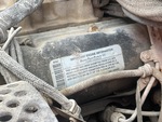 Engine with Emission Certification Label