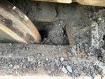 Undercarriage with Left Track Tensioner