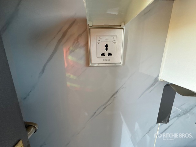 7 ft 1 in x 6 ft 3 in Skid-Mounted Portable Toilet | Ritchie Bros