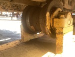 Undercarriage with Usura dei rulli di supporto