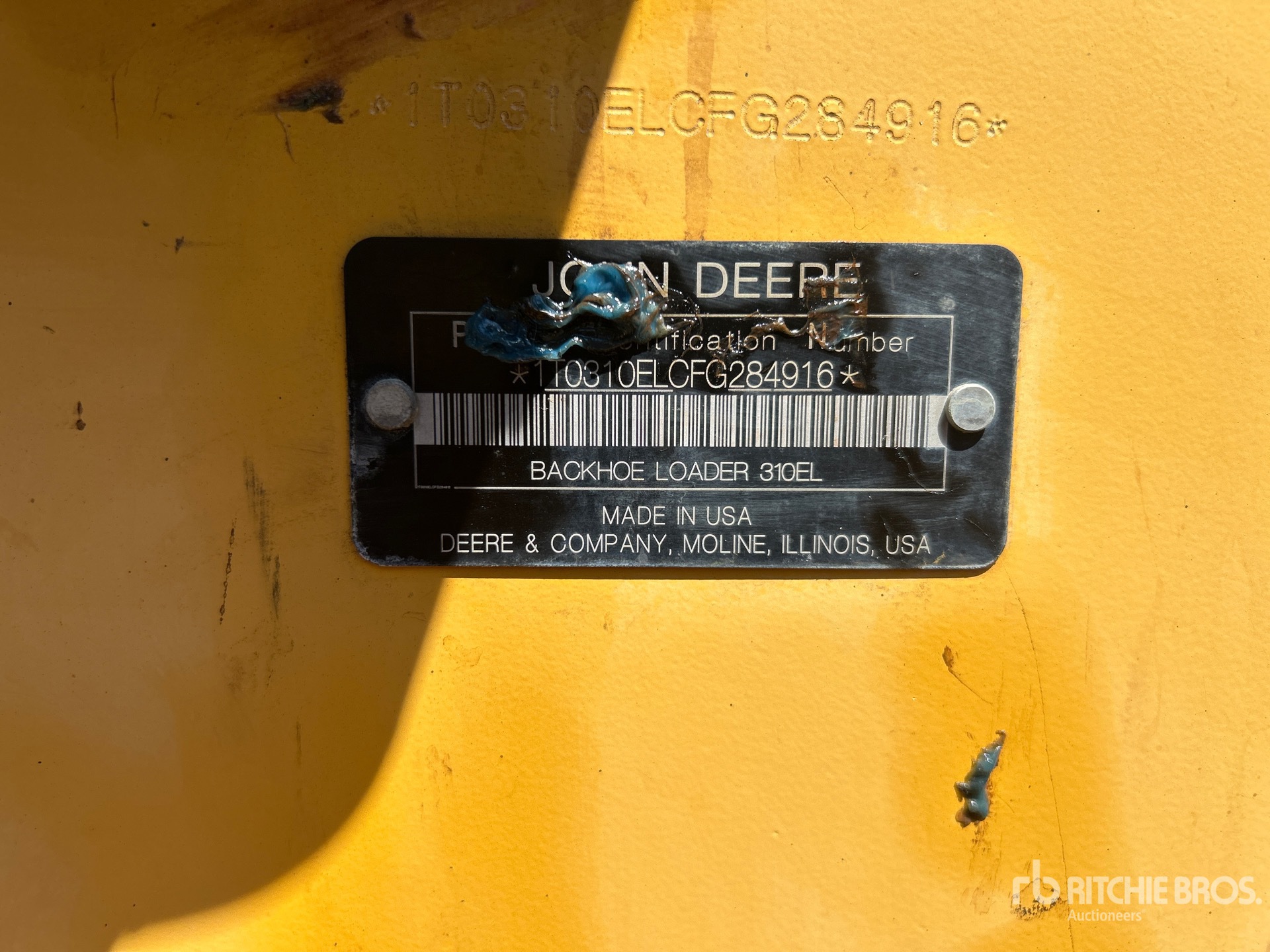 Photo of a 2015 John Deere 310L