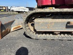 Undercarriage with Left Track Tensioner