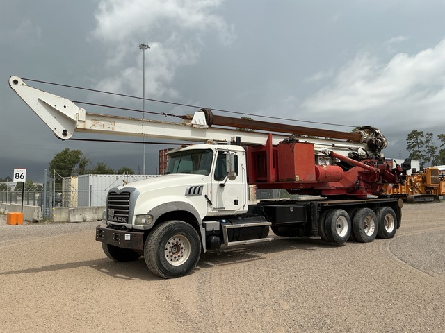 MHD-100 on,  2013 Mack GU713 Granite 8x4 Tri/A with lift axle Drill Truck