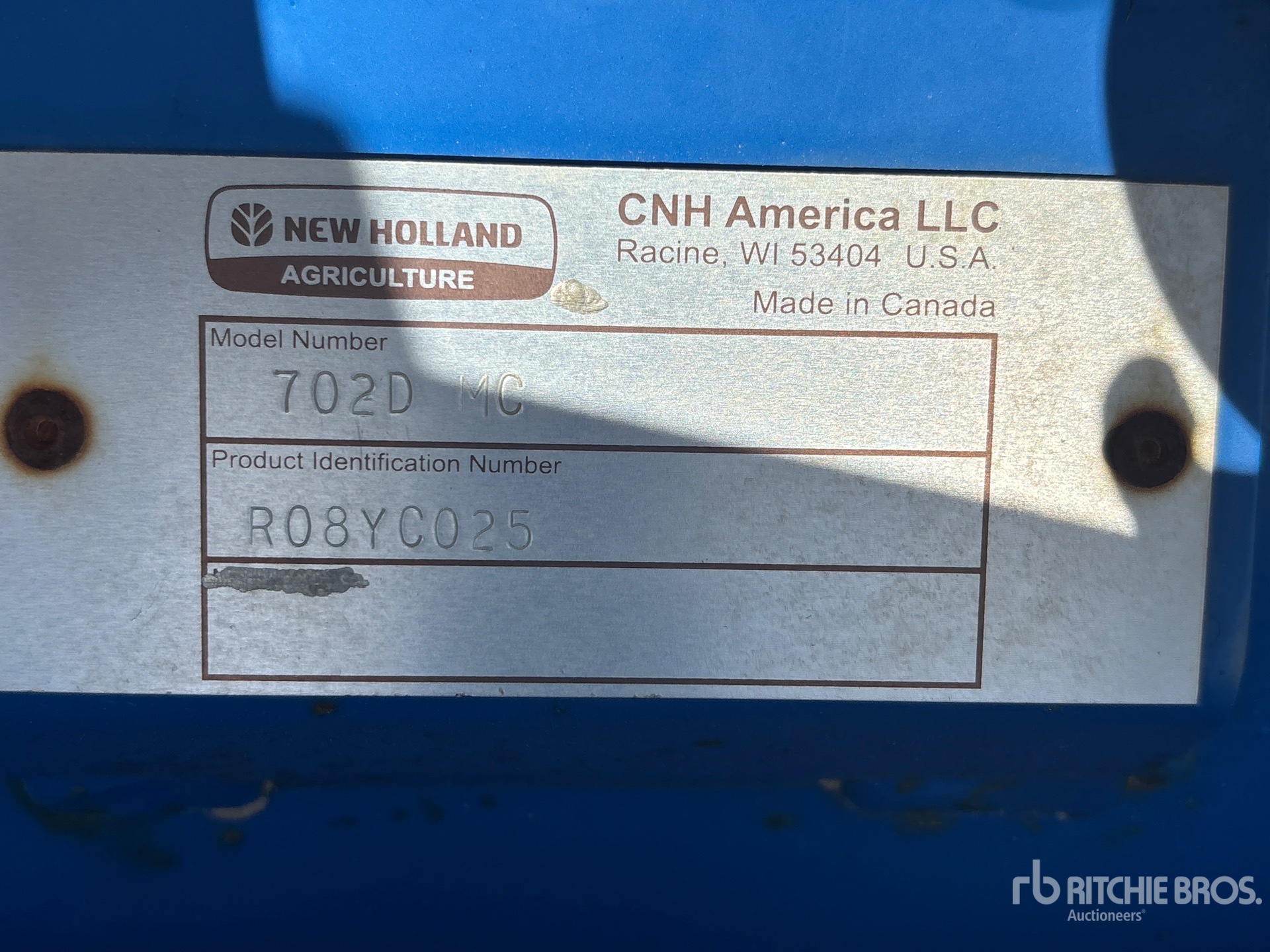 Photo of a 2010 New Holland 702D MC