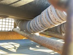 Conveyor/Rollers with Impact Idlers in Hopper Area