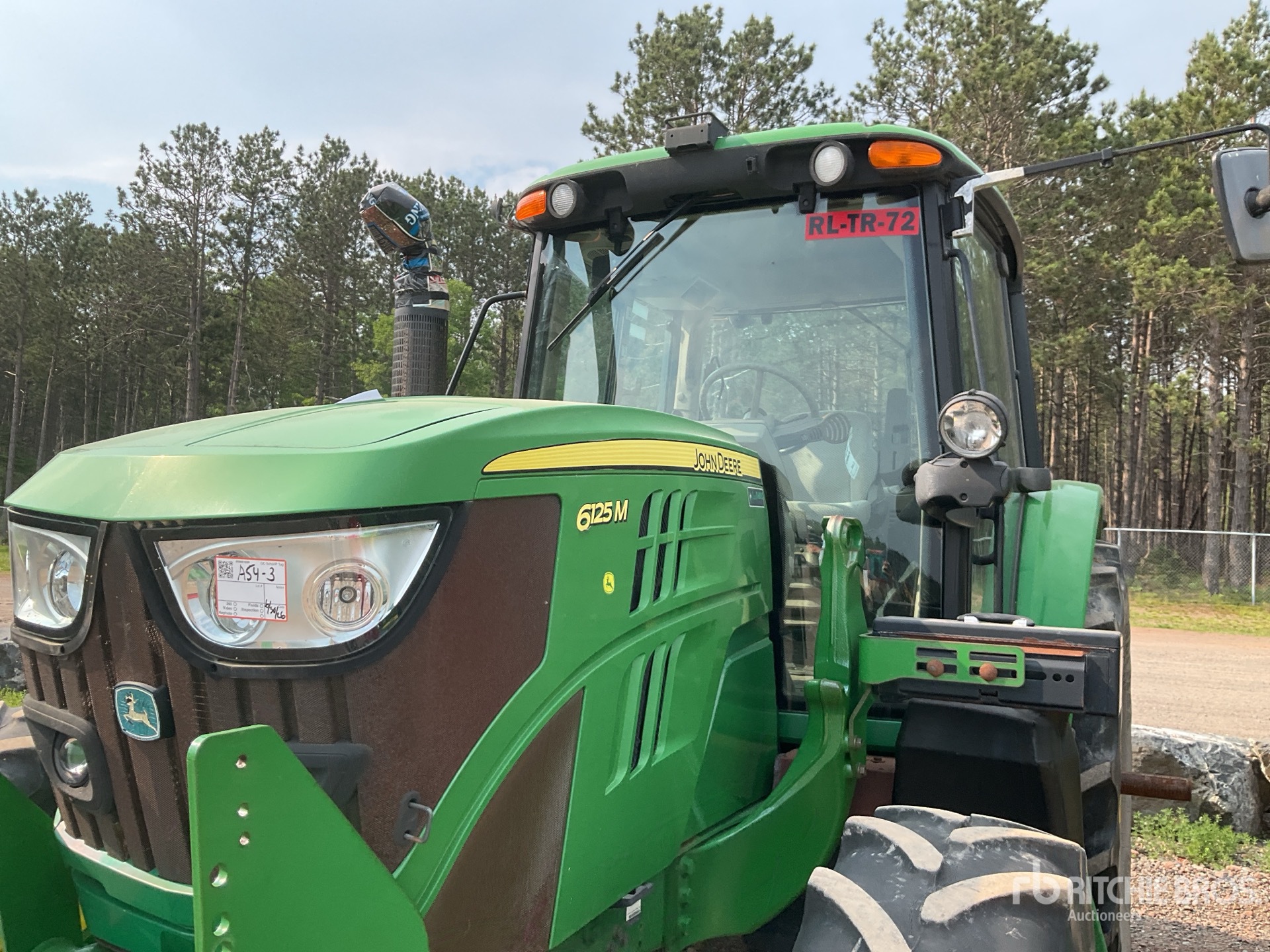 Photo of a 2015 John Deere 6125M