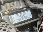 Engine with Emission Certification Label