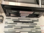 Interior with Stove Hood Exhaust Fan and Vent Cover
