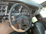 Cab with Steering Controls