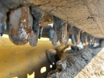 Undercarriage with Rubber Belt Drive Lugs