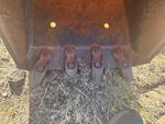 Backhoe with Backhoe / Excavator Bucket Shanks and Teeth