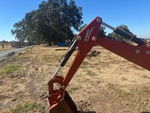 Backhoe with Stick Condition