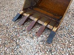 Specialty with Backhoe / Excavator Bucket Shanks and Teeth