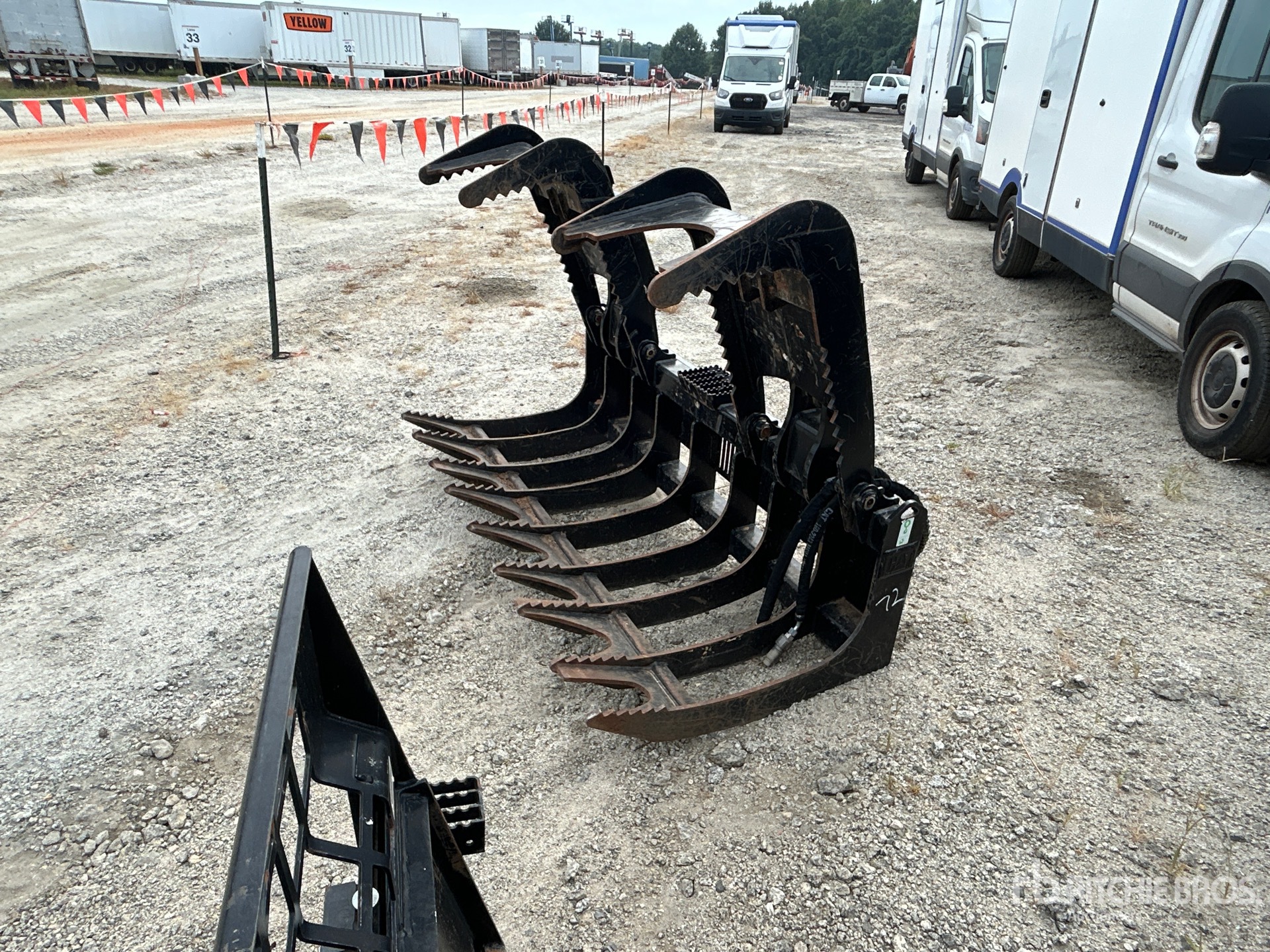 Photo of Caterpillar 72 in Root Grapple