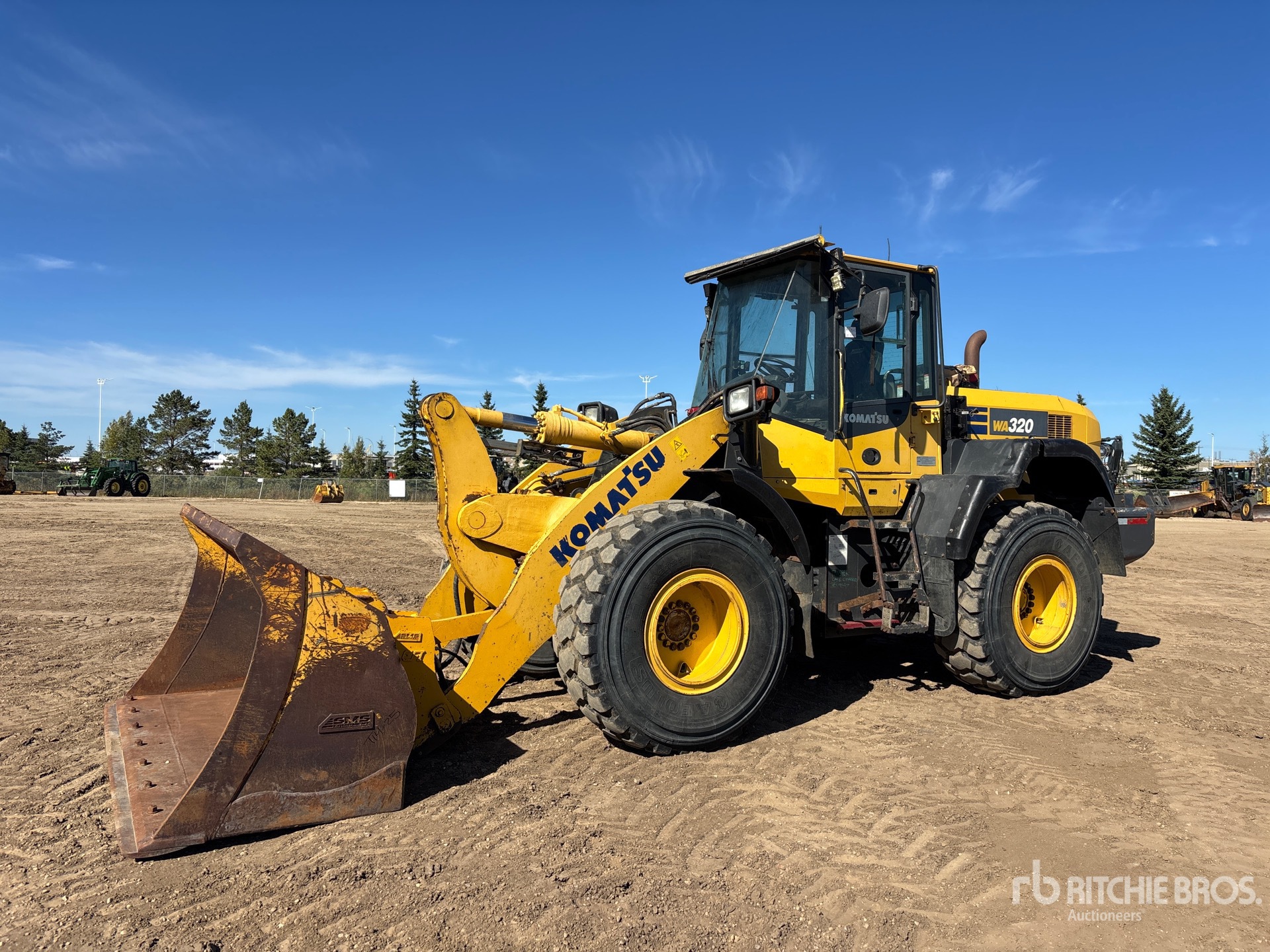 Photo of 2015 Komatsu WA320-7