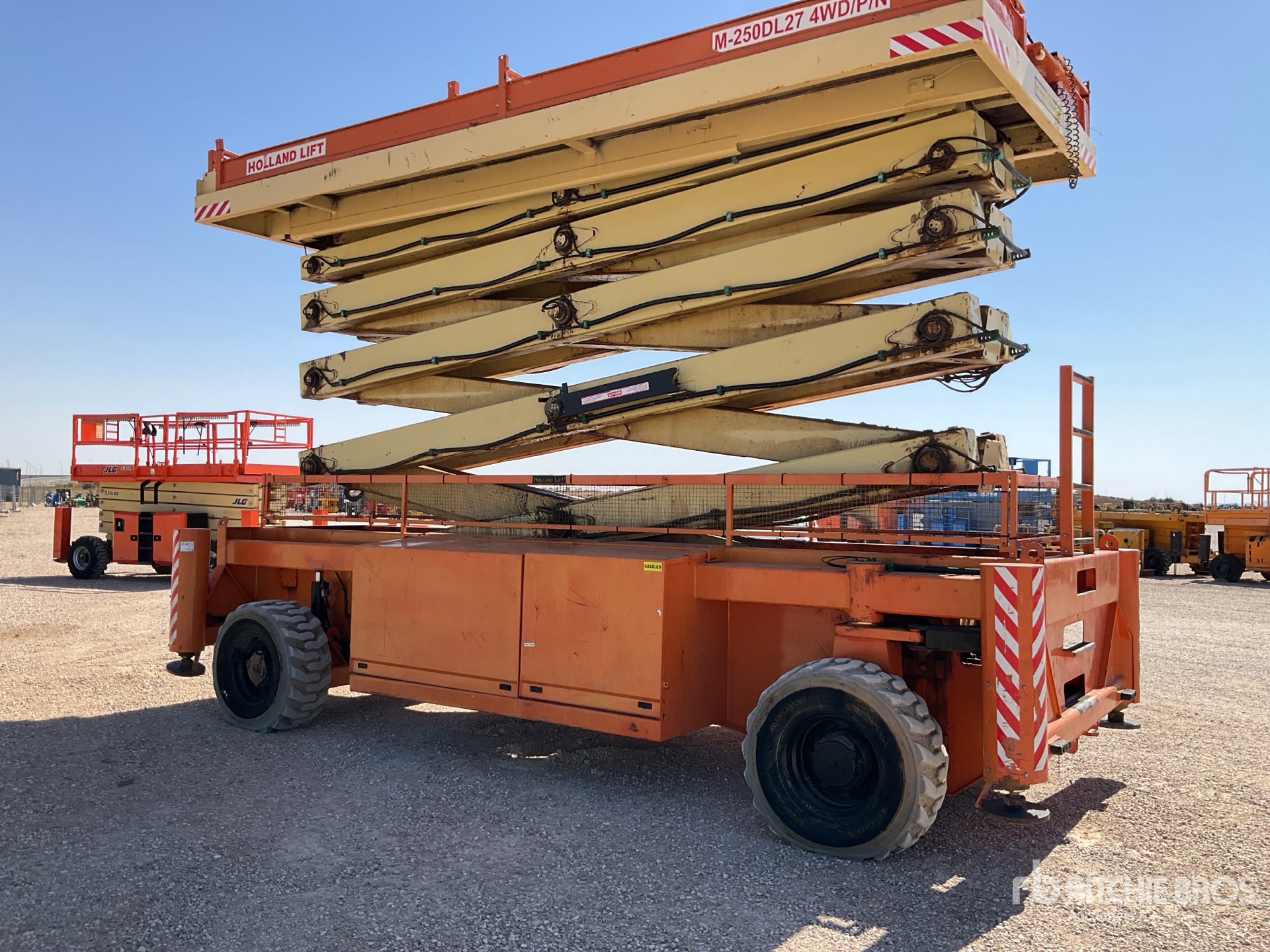 2009 Holland Lift M-250DL27