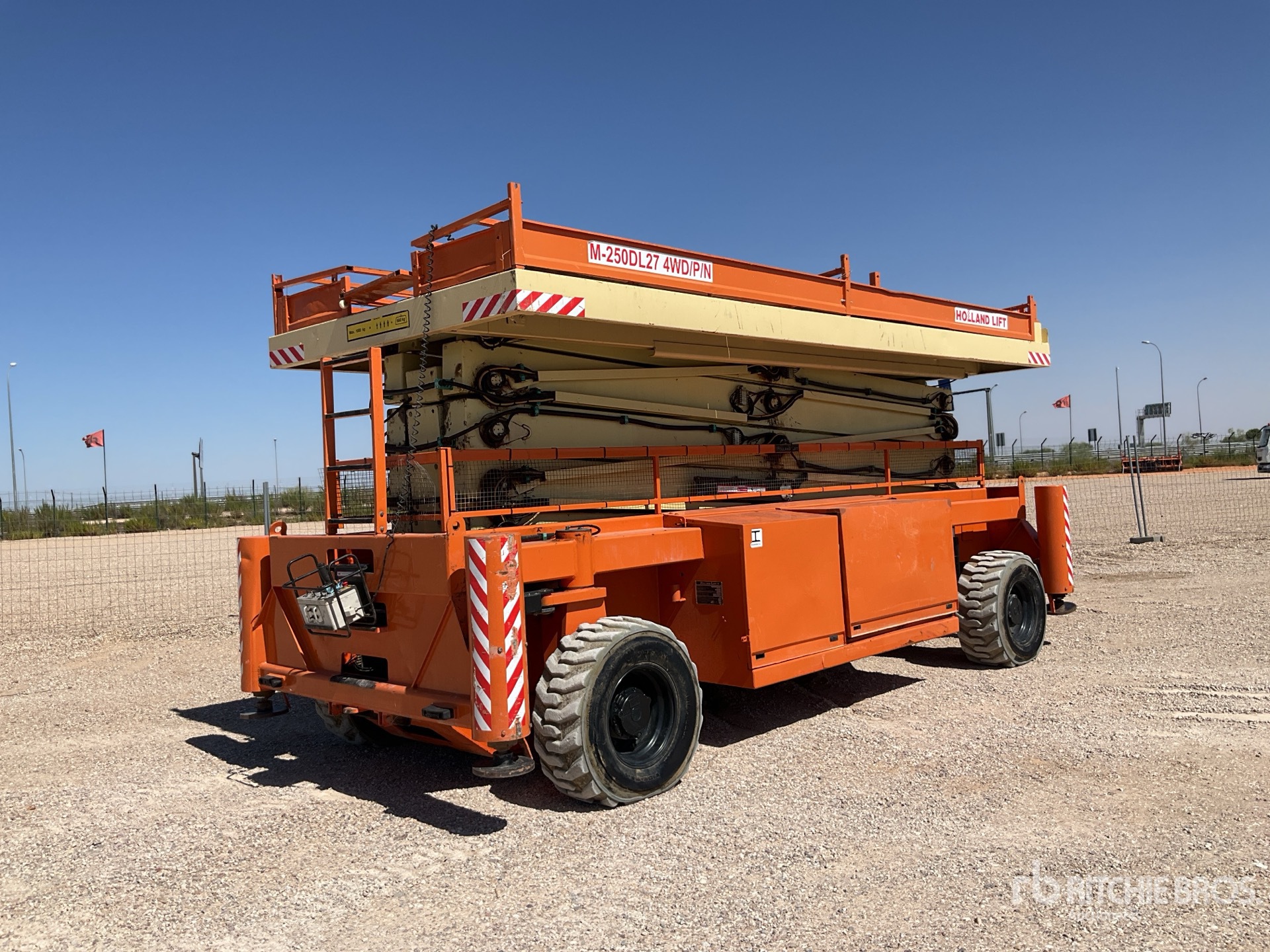 2009 Holland Lift M-250DL27