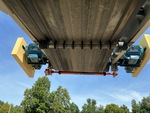 Feeder with Discharge Conveyor Rollers