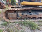 Undercarriage with Left Track Tensioner
