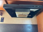 Interior with Stove Hood Exhaust Fan and Vent Cover