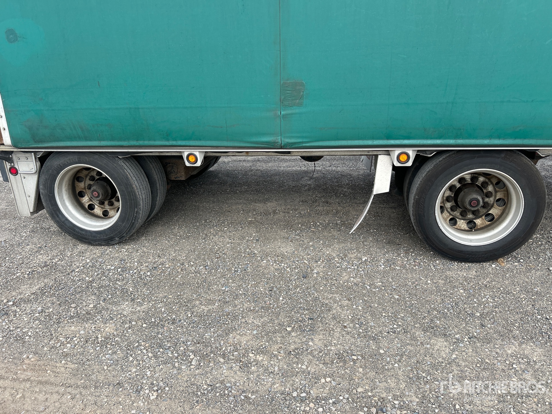 2013 Reitnouer 48 ft T/A Spread Axle Step Deck