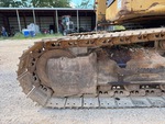 Undercarriage with Left Track Tensioner