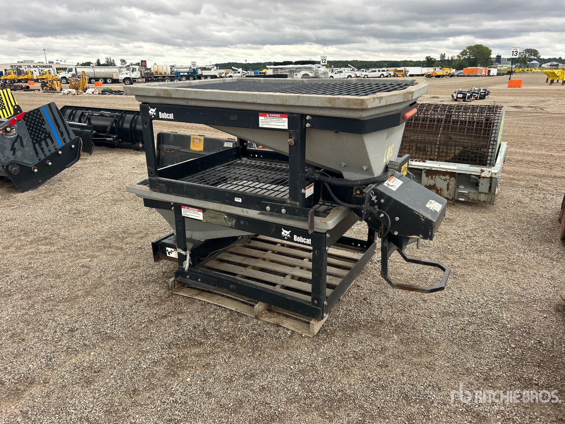 Bobcat QUANTITY OF (2) SAND SPREADERS